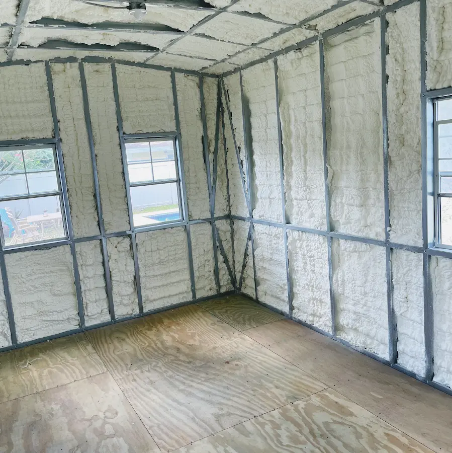 Closed-cell spray foam insulation applied to wall cavities in a residential project in Cortland